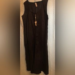 Italian boutique. Sleeveless Black dress. Purchased while in Italy. Brand new.